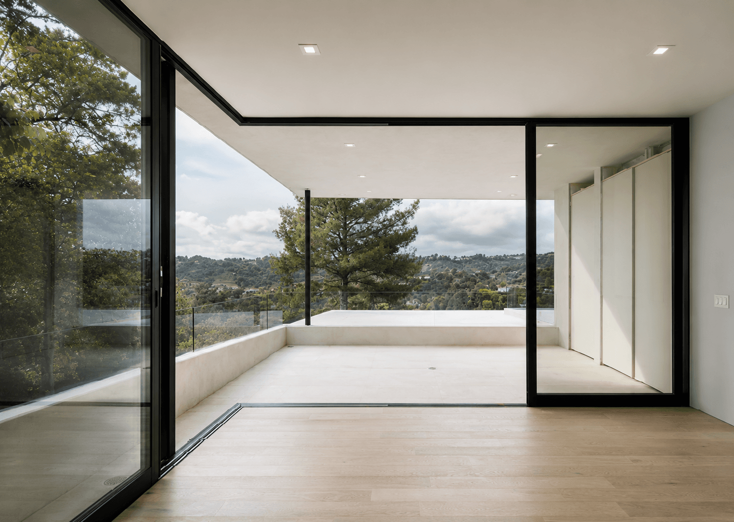A pocket sliding door parks inside the wall cavity.